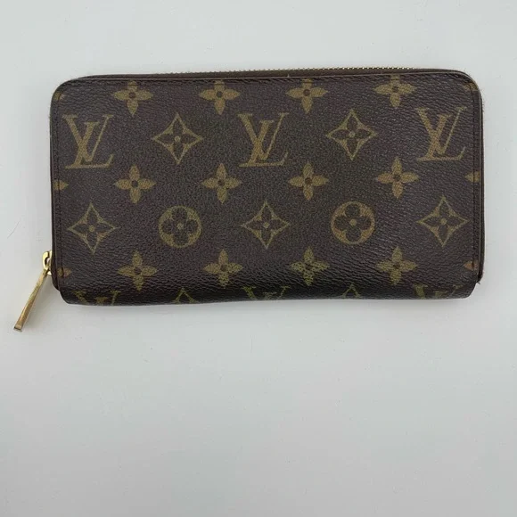 Authentic Preowned Louis Vuitton Zippy Wallet Monogram Brown Interior - Picture 1 of 9